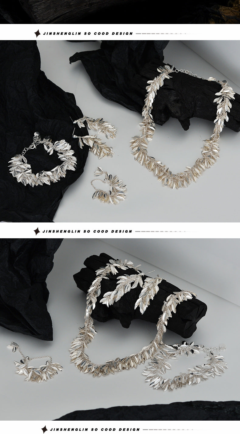 Straw skirt swaying silver earrings