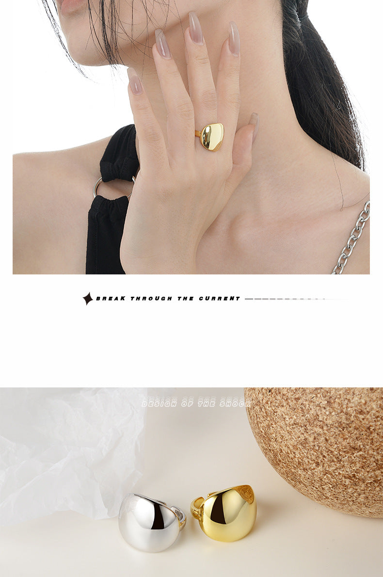 Large glossy open silver ring